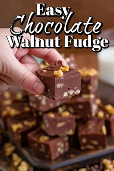 chocolate walnut fudge is being held up to the camera with text overlay that reads easy chocolate walnut fudge