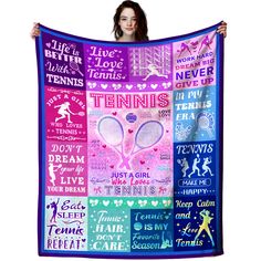 a woman holding up a purple and blue tennis towel with the words, i love tennis