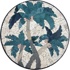 a round mosaic with palm trees and leaves on it's side, in blue tones