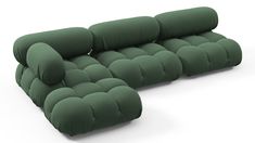 a set of four green cushions sitting on top of each other