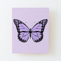 a pink butterfly with black outline on it's wings