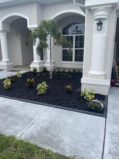 a house with landscaping in front of it