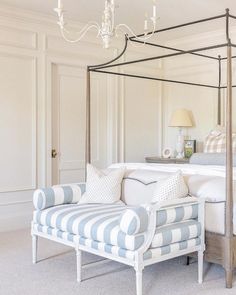 the instagram page shows an image of a bedroom with a canopy bed and white walls