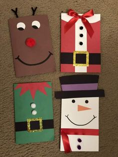 three paper bags decorated like santa claus, snowman and rudolph the red nosed reindeer