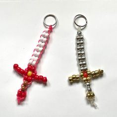 Handmade with pony beads. About 5 X 2.5 inches. Colors and size may vary slightly. Each sword comes with a metal ring or clip. Keychains are perfect for backpacks, purses, tote bags, pin boards, wall decor, and more. Pony Bead Cross Keychain, Minecraft Pony Bead Patterns, Keychain Ideas Diy Crafts, Things To Make Out Of Pony Beads, Diy Pony Bead Crafts, Pony Beads Animals, Seed Bead Animals Patterns Easy, Pony Bead Projects Key Chains, Pony Bead Pokemon