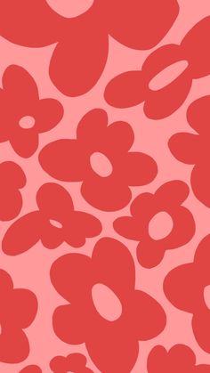 a red and black flower pattern on a pink background