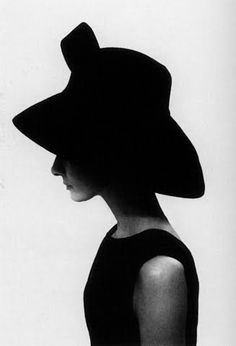 an image of a woman with a hat on her head and the caption reads beautiful, unique portrait audrey