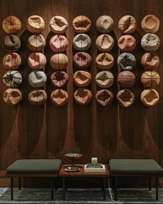 the wall is decorated with many different types of doughnuts