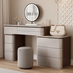 an elegant dressing table with mirror, stool and handbag on the floor in front of a window