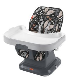 a high chair with an infant seat attached to the back and armrests on it