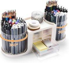 an assortment of pens and pencils are shown in this desk organizer with clear drawers