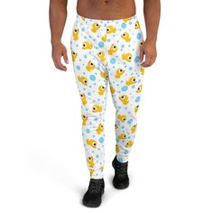 Introducing the All-Over-Print Men's Recycled Joggers--the perfect addition to your activewear and streetwear wardrobe! Whether you're powering through a yoga session, hitting the gym, or lounging at home, these joggers deliver both style and comfort. Crafted from a premium blend of 95% recycled polyester and 5% spandex, they feature a soft, cotton-feel fabric with a cozy brushed fleece interior. With a slim fit and cuffed legs, these joggers offer a flattering silhouette while maintaining flexibility for all your movements. Complete with practical pockets, an elastic waistband, and a white drawstring, these joggers are as functional as they are stylish. Designed for eco-conscious fashionistas, they are certified by both OEKO-TEX 100 and the Global Recycled Standard (GRS). For the perfect Comfy Lounge Pants, Printed Joggers, Womens Sweatpants, Jogger Sweatpants, Streetwear Outfits, Lounge Pants, Workout Leggings, Fashion Pants, Jogging