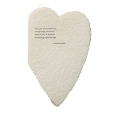 a piece of paper that has a heart on it with a poem written in the middle