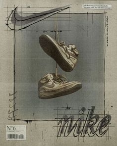 a drawing of two shoes hanging from a wire on top of a piece of paper