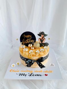 a birthday cake with an image of a woman on top