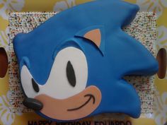 a birthday cake shaped like sonic the hedgehog