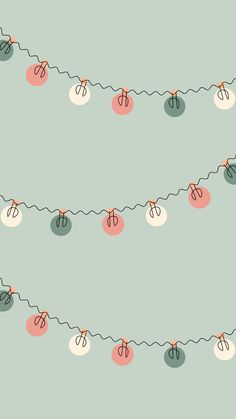 a string of sewing needles and scissors on a light green background with pink, white and grey balls