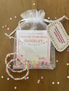 a bag with some items inside of it on a wooden table next to stars and confetti