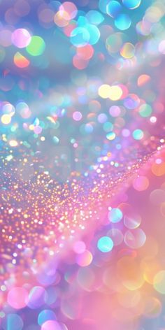 an abstract background with lots of colorful lights in the center and blurry boke