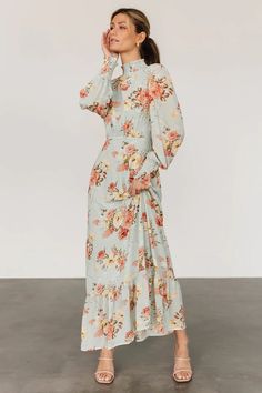 You do not want to miss out on our brand new Luciana Maxi Dress in a cute beige and rose floral color. This dress features flowing chiffon material and a high smocked neckline. Blue Wedding Guest Dresses, Long Sleeve Satin Dress, Dress Sage, Sage Dress, Baltic Born, Modern Clothing, Tiered Maxi Skirt, Mob Dresses, Sequin Maxi Dress