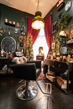 This hair salon studio in Murrieta, California has a gothic theme with LED candles and a wallpaper accent wall to create a moody, dark feel. Antique Salon Ideas, Private Nail Salon, Dark Moody Salon Suite, Dark Beauty Salon Aesthetic, Gothic Salon Suite, Gothic Hair Salon Decor, Dark Salon Suite, Cottage Core Hair Salon, Moody Hair Salon Aesthetic