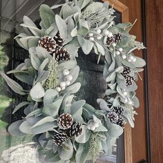 A festive modern lambs ear wreath with snowy berries, snowy pinecones and flocked juniper greenery accents. Reminiscent of a winter wonderland! Create a warm festive and inviting entry to your home with this winter wonderland vibe wreath! Also great for adding a festive touch to your interior home decor for this winter holiday season!  Handmade with quality faux materials on a natural grapevine wreath that will last for years to come. A handmade item best hung where protected from outdoor elemen Flocked Christmas Wreath, Snowy Pinecone, Woodland Home Decor, Winter Owl, White Berries, Lambs Ear Wreath, Evergreen Wreath, Winter Woodland, Rustic Glam