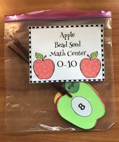 an apple seed seed math center sign on top of a bag