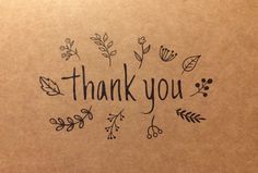 thank you written in black ink on brown paper