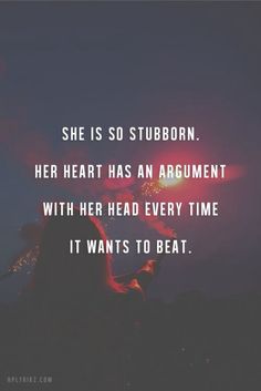 a person standing on top of a hill with the words, she is so stubborn her heart has an argument with her head every time it wants to beat