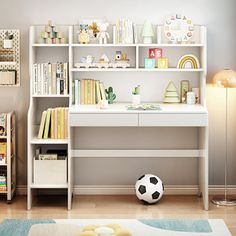 a child's room with bookshelves, desk and soccer ball