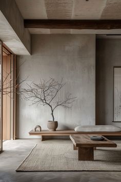 a living room filled with furniture and a tree