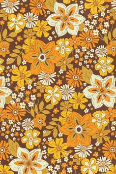 an orange and yellow flower pattern on a brown background