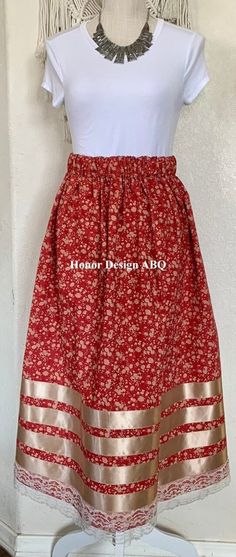 "Traditional Ribbon Skirt red, beige prairie floral print, accented with beige satin and ivory lace ribbon.  Finished with elevated  details and lovingly made by hand. A paper bag waist hugs the body, while also being comfortable to wear. See our sizing details below to find your perfect size.  Ready to ship! A long time symbol femininity, sisterhood and solidarity, used in ceremony and everyday, every skirt tells a story written by the woman who wears it. Perfect for every season, dressed up or Red Ribbon Skirts Native American, Ribbon Skirts Ideas, Ribbon Skirts Native American, Crochet Ribbons, Time Symbol, Ribbon Clothing, Native Outfits, Native American Dress, Grad Outfits