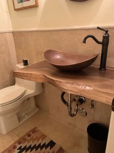 a bathroom with a sink and toilet in it