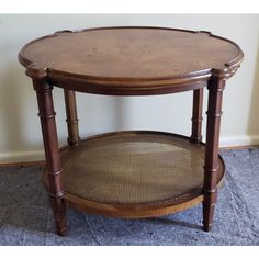 a wooden table sitting on top of a carpeted floor