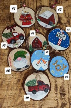 christmas ornaments are displayed on wooden boards with numbers in the shape of santa's hats