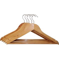 a wooden hanger with five pairs of clothes on it