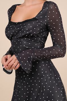 You'll be the biggest catch of the season in the Lulus Especially Adored Black Polka Dot Long Sleeve Mini Dress! A classic white polka dot print adorns stretchy mesh as it shapes a square neckline with lacy trim and a rosette detail, all framed by long sleeves with elastic at the shoulders and flared cuffs. Fitted bodice boasts an empire waist that continues into a figure-skimming A-line skirt with a mini hem. A top loop-button closure secures atop a keyhole cutout at the back. Hidden back zipper/clasp. Fit: This garment fits true to size. Length: Mid-thigh. Size medium measures 32.25" from shoulder to hem. Bust: Great for any cup size. Waist: Fitted - stretchy fabric allows custom fit. Hip: Not Fitted - fuller skirt allows room for hips. Undergarments: May be worn with a strapless bra, ad Dress With Lace Trim, Mini Dress Long Sleeve, Mesh Mini Dress, Long Sleeve Mini, Strapless Bra, Polka Dot Print, Black Polka Dot, Dot Print, Long Sleeve Mini Dress