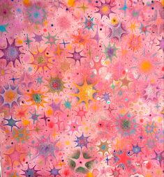 a pink background with many different colored stars and circles on it, as well as the word