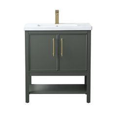 a bathroom vanity with a white sink and gold faucet on the front side