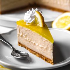 a slice of lemon cheesecake on a plate with a fork