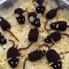 some kind of food that is in a pan on the table and ready to be eaten