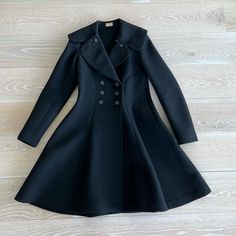 Alaia Paris Double Breasted Black Wool Coat. In Excellent Condition. French Size 38. Timeless Piece, First Designed In 2004. Adhering To Tradition With Double Breasted Button Fastenings And A Gentle Construction, The Versatile Silhouette Is Given A Signature Alaia Update By Way Of An Elegant Trapeze Skirt. Peplum Coat, Black Wool Coat, Black Wool, One Design, Wool Coat, Timeless Pieces, Double Breasted, Jackets For Women, Jackets & Coats