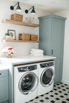 a washer and dryer in a small room