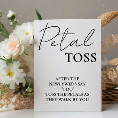 a greeting card that reads petal tos after the newlyweds say i do toss the petals as they walk by you