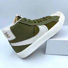 Nike Zoom Blazer Mid Premium Pilgrim Green & Phantom Sneakers. Suede And Canvas Upper. Reinforced Double Stitching. Lace Up Closure With Recessed Eyelets. Lightly Padded Tongue And Lined Collar. Felt-Lined Interior. Nike Zoom Air Sockliner With Air Unit In Heel For Impact Support. Soft Cushioned Soles. Rubber Herringbone Tread Pattern For Grip. Brand New Nike Sb Zoom Blazer Mid, Nike Sb Blazer, Nike Sb Zoom, Air Max Women, Nike Flyknit, Pink Nikes, Blazer Mid, Air Huarache, Nike Air Huarache