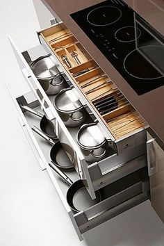 an oven with pots and pans in it