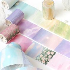 several rolls of washi tape sitting on top of a table next to each other