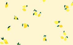 a group of lemons flying through the air on a yellow background with green leaves