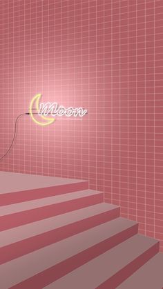 a room with pink tiles and a neon sign that says moon on the wall above it